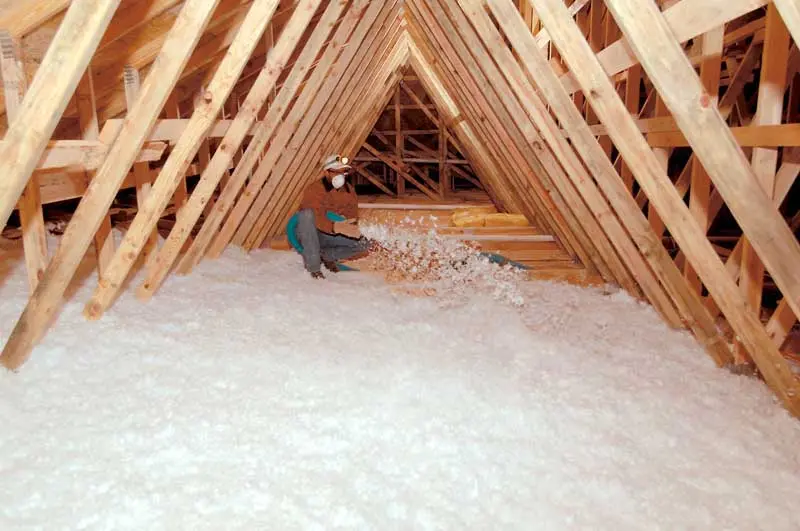 Blown-in insulation being installed in an attic in Odessa, TX