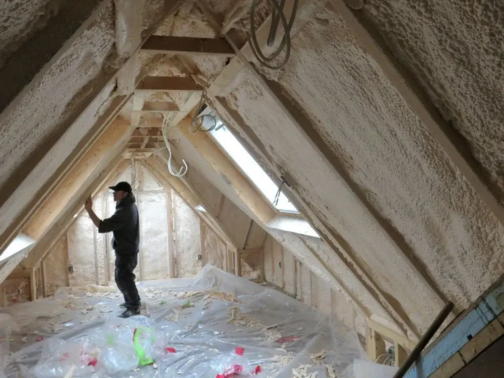 Midessa Insulation contractor installing insulation on a Midland property